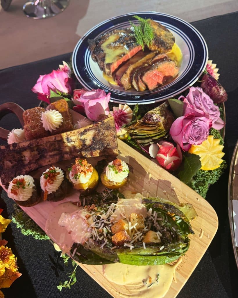 • Wagyu Ribeye Oscar Style
• Coal Smoked Crab Cake with Béarnaise Sauce
• Twice Baked “New School” American Cheese Potato
• Roasted Bone Marrow
• Grilled Tableside Caesar with Bone Marrow Croutons
• Hard Truth Whiskey & Five Monkeys BBQ Caramel Sauce Bourbon Cake with Beef Tallow Buttercream